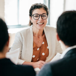 woman in office smiling