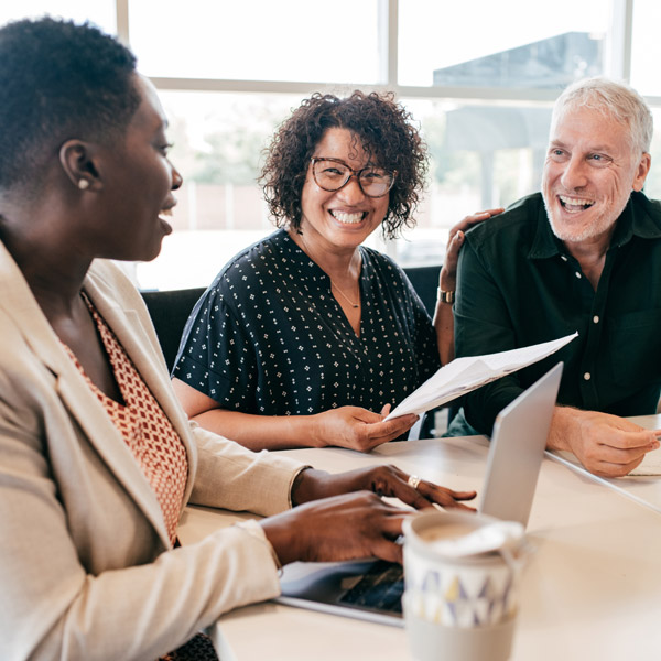 mature couple meeting with financial adivsor